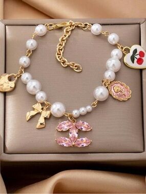 Target Gold-Tone Pearl Bracelet with Pink Crystal Logo and Enamel Charms